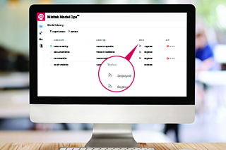 Closeup of feature to operationalize predictive models in Minitab Model Ops on an office computer.